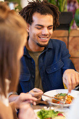 Poster - happy couple eating at restaurant