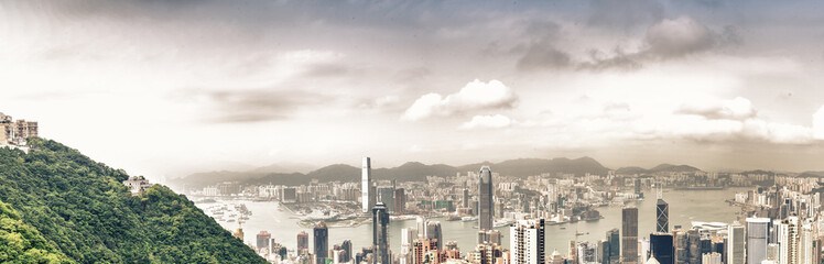 Sticker - HONG KONG - MAY 10, 2014: Hong Kong cityscape, aerial view. The city is a great tourist destination, visited by more than 35 milion people every year