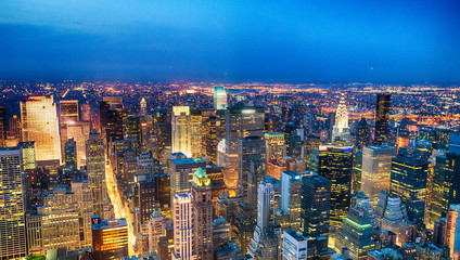 Wall Mural - Aerial view of Midtown skyscrapers at night, New York City