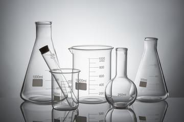 Wall Mural - laboratory glassware set with reflections