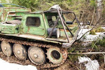 Old skidder at the forest in summertime