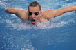 © lenets_tan - Male swimmer at the swimming pool. Underwater photo. Male swimmer.