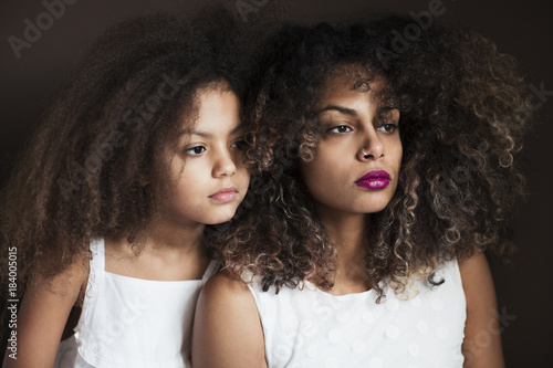 Portrait Of A Mixed Race Little Girl And Woman Buy This Stock