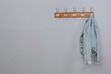 Denim jacket hanging on hook