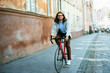 © puhhha - Cycle To Work. Stylish Male Cycling On Bicycle On Street.
