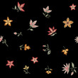 Embroidered flowers. Floral print. Vector seamless pattern.