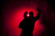 © Viktorie - Silhouette of a dancer man in red light
