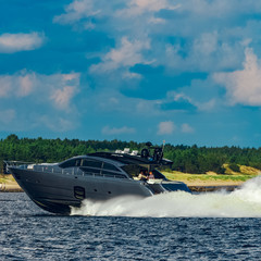 Wall Mural - Grey motor yacht in move