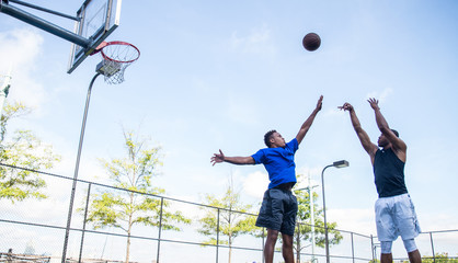 Basketball player playing outdoors