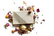 blank sheet of paper sprinkled with petals of dried roses pattern
