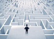© ra2 studio - Businessman staring at infinite maze