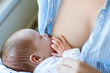 breastfeeding schedule for a newborn baby. responsible attitude to motherhood. family values.