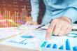 © joyfotoliakid - Businessman writing the trading graph of stock market