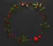 © Prostock-studio - Christmas decoration frame on black background
