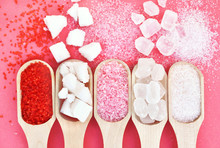 Mix Of Sugar Varieties: Pink, Red And White, Refined, Granulated And Cubes, Selective Focus