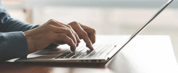 programmer at work. creating apps. man coding on the laptop. software developer. it sphere.