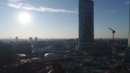 Fototapete - New CityLife financial district in Milan, aerial video of the square and the high glass and steel skyscrapers around.