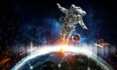 Wall Mural - astronaut play soccer game