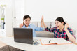 © PR Image Factory - happy female college students celebrating together