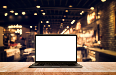 Wall Mural - Modern computer,laptop with blank screen on table cafe shop