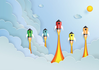 Wall Mural - rocket ship flying on cloud and blue sky.paper art style of start up and business team work creative