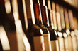 © Ilshat - Wine cellar with elite drinks on shelves with written names