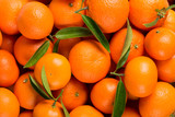 Fototapeta  - Background of tangerine fruits.