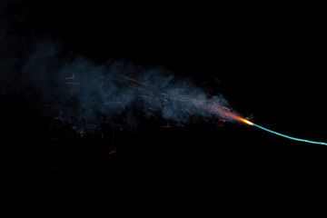 Burning fuse with sparks isolated on black background