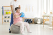 © Photographee.eu - Senior woman exercising in clinic