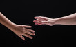 © Watcharin - Closeup human hand touch together.