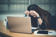 © reewungjunerr - Asian businesswoman stress from hard work,Thai worker woman working in the office,Dark tone
