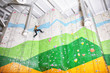 © Africa Studio - Young man exercising in climbing gym
