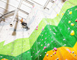 © Africa Studio - Young man exercising in climbing gym