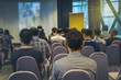 © THANANIT - Closeup some attendee over the Abstract blurred photo of conference hall or seminar room background