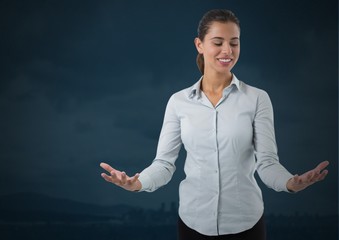 Poster - Businesswoman with hands palm open and dark background