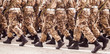 Soldiers in the form of khaki march in formation.