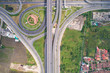 Intersection traffic circle road with car and green tree