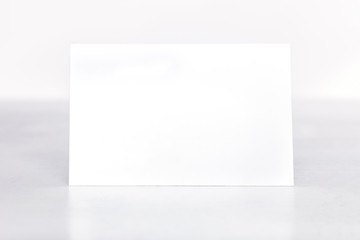 Wall Mural - Blank business card mockup on a light background