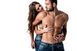 © LIGHTFIELD STUDIOS - front view of sensual half naked couple in jeans hugging isolated on white