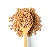 Lentils In Wood Spoon On White Background