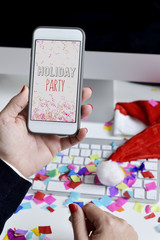 Wall Mural - text holiday party in a smartphone