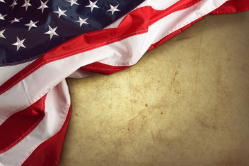 American flag on brown background. Copy space