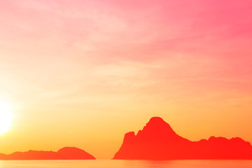 Wall Mural - bright colors at dawn on the beach at sunrise in the gulf of thailand.