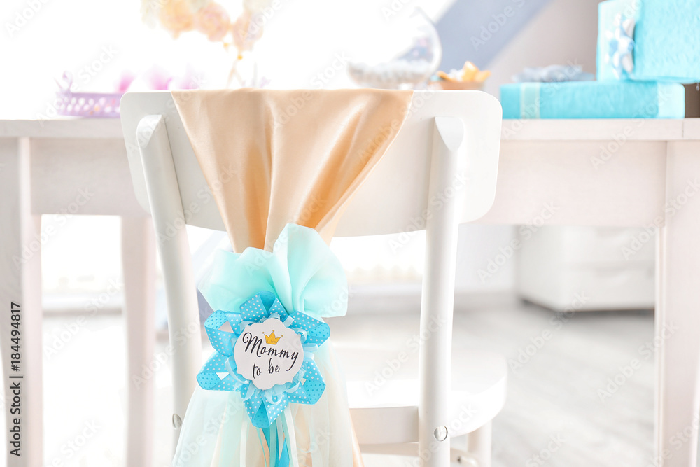 Chair decorated with award ribbon, indoors