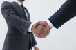 © ASDF - Businessman by handshake invites to cooperation.