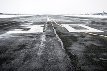 Wet To The Airport In Cloudy Weather In Winter.
