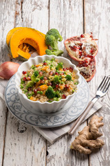 Canvas Print - quinoa salad with mixed vegetables pomegranate and ginger