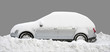 Silver car covered in snow