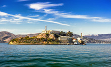 Alcatraz Island And Former Federal Penitentiary On Sunny Day In San Francisco Bay, California