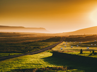  beautiful landscape with road and mountains at sunset, Iceland